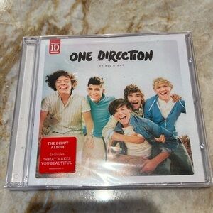 New unopened One Direction CD Up all Night.